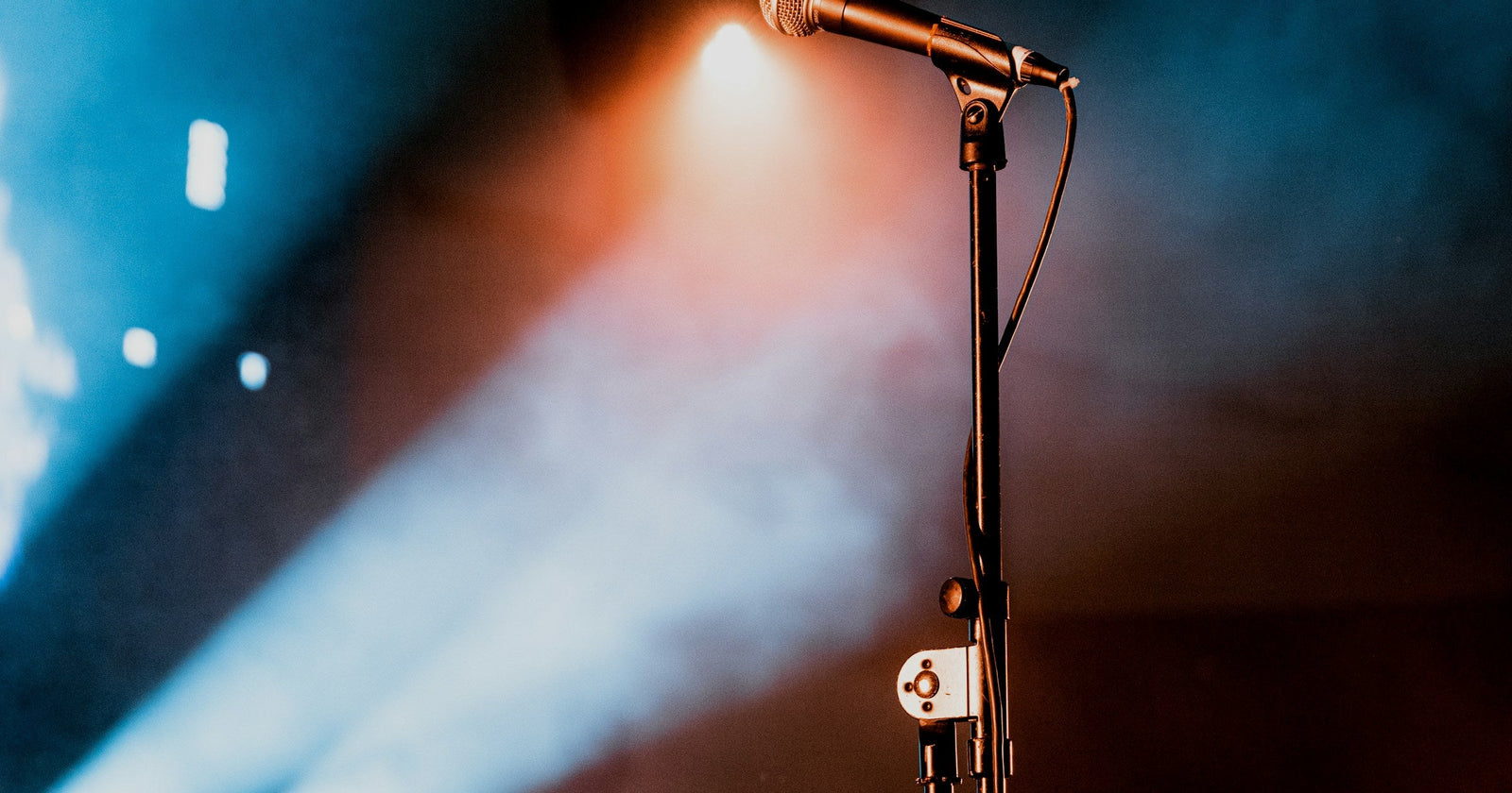 A microphone on a smoky stage